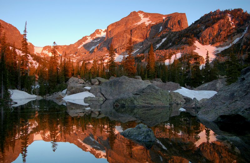 Hallett Peak at dawn reflected in Lake Haiyaha, Rocky Mountain National Park